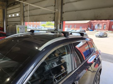 Автомобиль Exeed LX. Установлен багажник от компании LUX(ЛЮКС) Scout2. Багажник ставится с дополнительным комплектом прижимов.